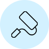 A picture of a paint roller on the ground.